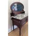 A stunning antique solid oak wash stand with cobalt-blue tiles, grey granite top and bobbin legs