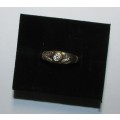 Ladie's 9CT Gold Ring with Stones - 1.5 Grams ( Stoned not Checked )