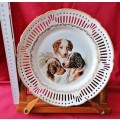 Vintage Reticulated Porcelain `Decorative Plate` with canine motifs -