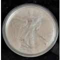 2012 - 1 OZ SILVER AMERICAN 1 DOLLAR COIN IN CAPSULE AND CASE