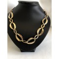 Gold Tone Necklace With Large And Small Oval Links
