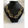 Gold Tone Necklace With Large And Small Oval Links