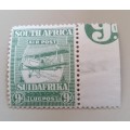 South African 1925 9d airmail stamp in Mint condition with 9d numeral in margin