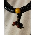 Chinese Qing Dynasty Buddhist mala beads made with 108 rosewood beads including 4 jade beads.