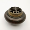 A copper incense burner with a longevity character pattern in the late Qing Dynasty of China