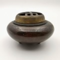 A copper incense burner with a longevity character pattern in the late Qing Dynasty of China