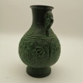 SOLID BRONZE ANTIQUE CHINESE VASE WITH RAISED RELIEF DECORATION.