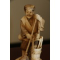 A Japanese ivory carved figure