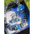 Sterling Silver Topaz Earrings and Bracelet Set
