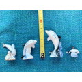 Porcelain dolphins (4) vintage, approx.from the  80s, collection item,