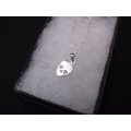 A 45 CM STERLING SILVER NECKLACE WITH A STERLING SILVER SKULL PENDANT - HEART EYES - SPECIAL !!!