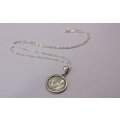 A LOVELY NEW STERLING SILVER NECKLACE WITH AN OLD STERLING SILVER PENDANT SET WITH A SILVER TICKEY !