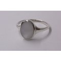 A CLASSY SOLID STERLING SILVER RING SET WITH A MOTHER OF PEARL LOOK INSET ....QUALITY !!
