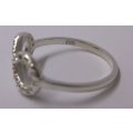 A VERY STYLISH SOLID STERLING SILVER ETERNITY SYMBOL RING WITH FANCY PATTERN