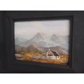 A LOVELY ORIGINAL OIL ON BOARD BY JUNE TUCKETT DEPICTING A HOMESTEAD SURROUNDED BY A MOUNTAIN RANGE