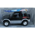 SWEET DUDE !! A 1:32 SCALE DIE CAST METAL MODEL OF THE TOYOTA RAV4 CABRIOLET WITH SURFBOARD ...NICE