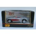 CLASSIC !! A 1:39 SCALE DIE CAST METAL MODEL OF THE 1957 CHEVROLET CORVETTE BY MAISTO...COOL !!