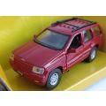 A HIGHLY DETAILED 1:42 SCALE DIE CAST METAL MODEL OF THE JEEP GRAND CHEROKEE BY MAISTO !!