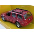 A HIGHLY DETAILED 1:42 SCALE DIE CAST METAL MODEL OF THE JEEP GRAND CHEROKEE BY MAISTO !!