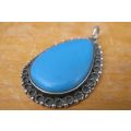 A GORGEOUS VINTAGE SOLID SILVER PENDANT WITH A TURQUOISE COLORED INSET ...BIG & EYE CATCHING !!