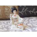 AN EYE CATCHING VINTAGE PORCELAIN DRUMMING GEISHA ORNAMENT !! HAND PAINTED !!