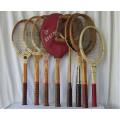 A collection of Vintage tennis racquets and a squash racquet