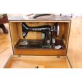 Model 99k Electric Singer Sewing Machine complete in carrying case