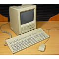 Mac SE keyboard & mouse plus collectable 512k shell with Steve Jobs and team signatures.