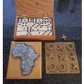 Noughts and Crosses in brass, vintage Domino box set and Africa Metal Puzzle (roughly 20 cm x 15 cm)
