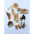 Music related brooches and pin badges   nice selection of 9