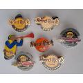 Hard Rock Cafe vintage pin badges  7 in total, one being the classic old style Hard Rock logo