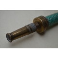 Brass antique hose pipe adjustable cone spray nozzle with the garden tap attachment. A nice prop.