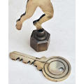 Solid Brass runner (ideal for a running trophy) and a brass key (ideal for a 21st) Early 1980s