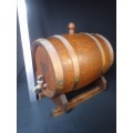 Vintage wooden oak wine/brandy barrel with brass tap