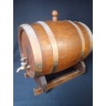 Vintage wooden oak wine/brandy barrel with brass tap