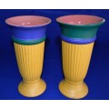 A set of Matching Ceramic Vases