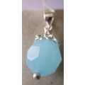 925 Sterling Silver and Blue Topaz Pendant.