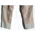 OLD FRENCH PARATROOPERS PANTS WHICH HAVE BEEN EXTENDED SO NO STRINGS AT BOTTOM OTHERWISE GOOD