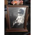 Antique wooden swinging picture frame