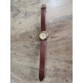 HALLMARK LADIES GOLD PLATED WATCH WITH GENUINE LEATHER STRAP