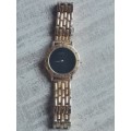 MENS GOLD PLATED SWISS MADE GUCCI WATCH VALUED @ R6000 IN EXCELLENT WORKING CONDITION