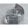 MENS HALLMARK WATCH WITH STAINLESS STEEL MESH STRAP IN EXCELLENT WORKING CONDITION