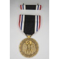Prisoner of War Medal, in original box with Ribbon and Bar, USA POW Medal
