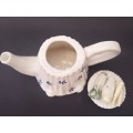 Cute little tea pot with vegetables on lif - in perfect condition
