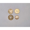 Four unidentified small coins