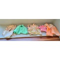 A box of doll`s clothes