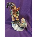 Vintage friedel figurine boy fishing (small chip  on base)