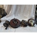 3 wooden fishing reels  and 1 bakerlight (all minor damage)