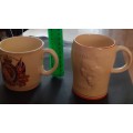 Two Mugs,Royal Coronation mug 1953 and 1947 relief design mug royal visit to South Africa