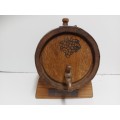 VINTAGE SOLID AND HEAVY OAK WINE BARREL WITH BRASS HOOPS ON A CUSTOM MADE STAND